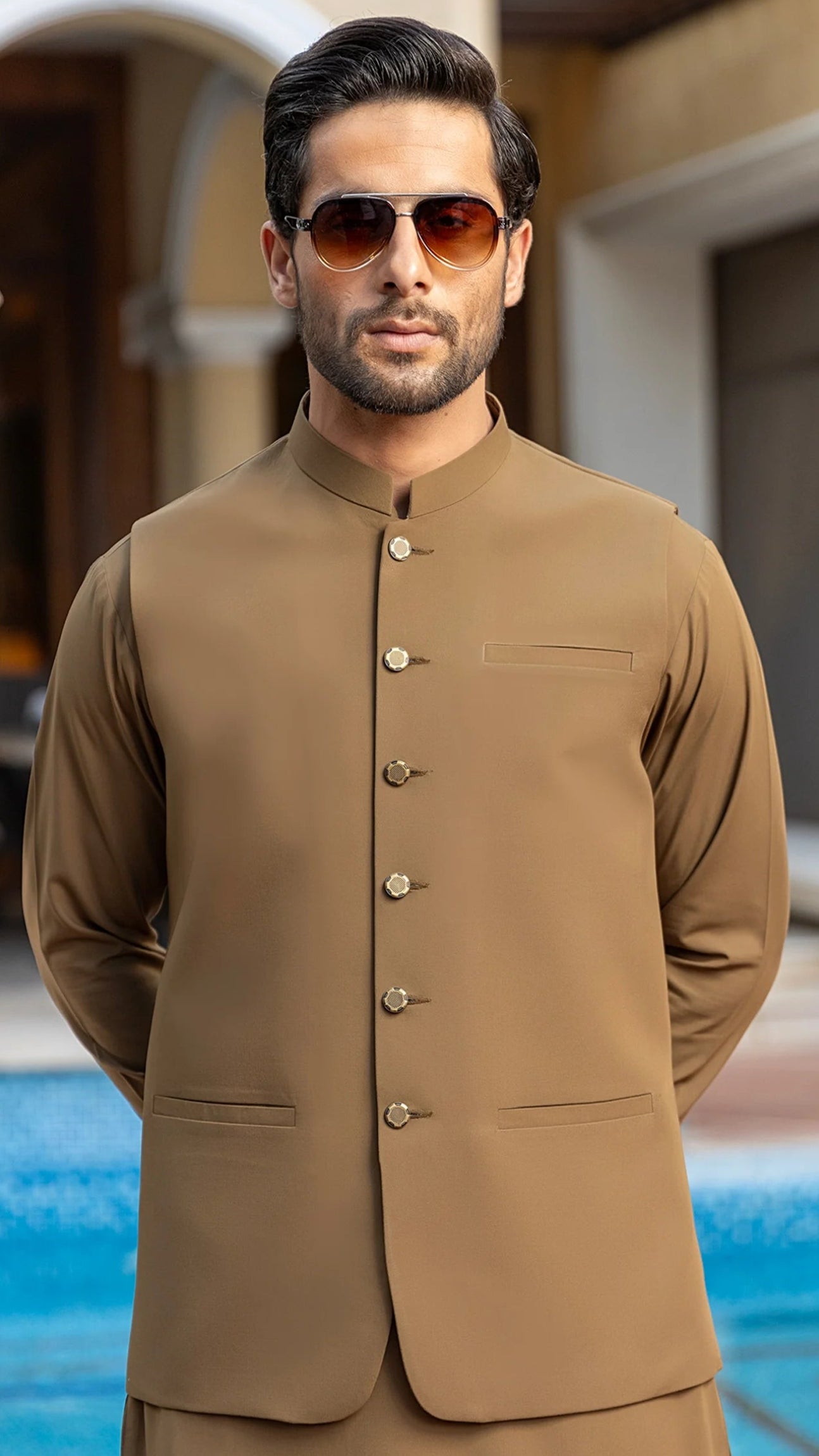 same waistcoat and shalwar kameez